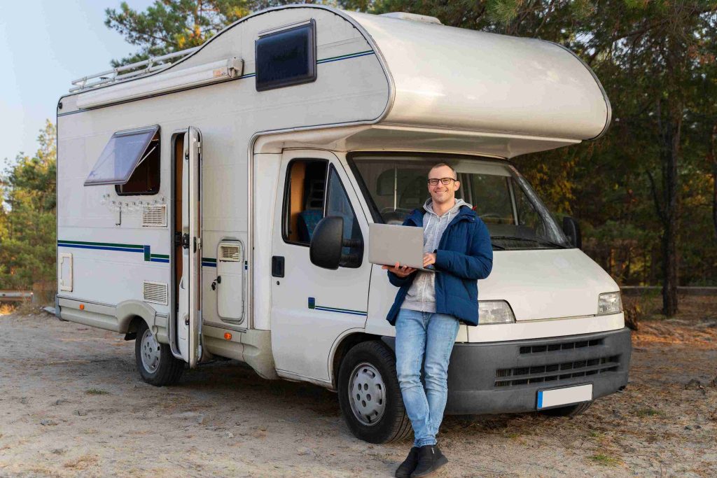 Pull-through vs back-in RV sites comparison showing both configurations at a peaceful RV park in East Texas with pine trees and full hookups