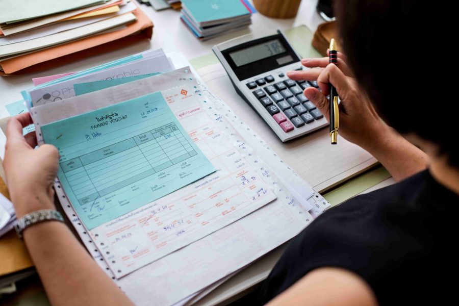 Clear utility bills and budget statements showing transparent utility costs, representing utilities included in RV rent with no surprise charges